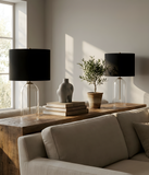 Eden Table Lamp – Clear Glass Base with Brass Stem and Black Fabric Shade