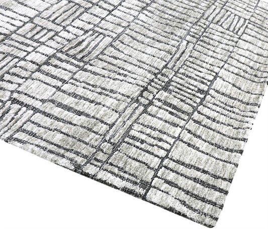 The Milton Knitted Rug blends traditional craftsmanship with modern practicality. Crafted from high-quality polyester knit, it offers a soft, durable texture that brings comfort and style to any room.